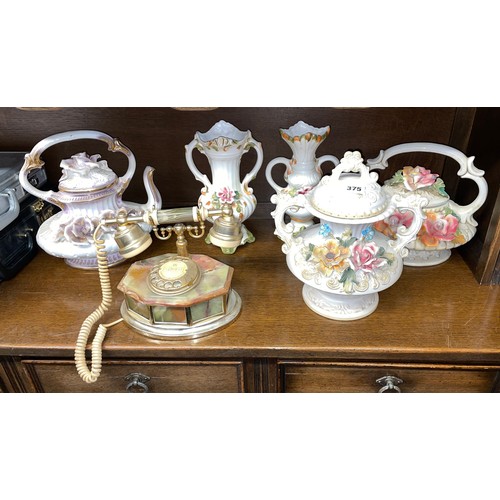 375 - CAPO DIMONTE FLORAL ENCRUSTED TEAPOTS, TWIN HANDLED JAR, AND A POLISHED ONYX ROTARY TELEPHONE