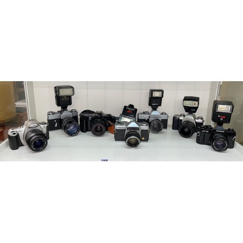 168 - SHELF OF FILM CAMERAS INCLUDING PENTAX MZ-M, SOSINA CT1G, ZENIT B, AND OLYMPUS