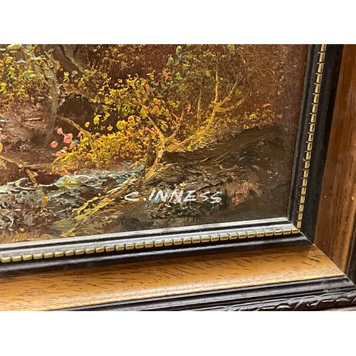 422 - 20TH CENTURY OIL ON BOARD OF AN AUTUMNAL LANDSCAPE SIGNED C. INNESS FRAMED