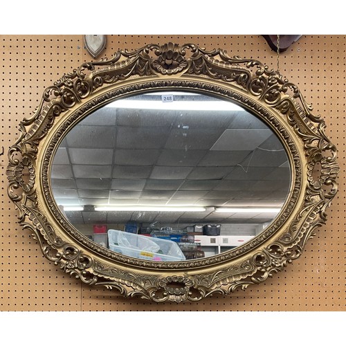 431 - GILT EFFECT ROCOCO OVAL LARGE MIRROR