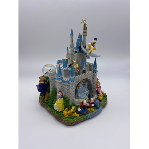 269 - DISNEY MAGIC KINGDOM MULTI GLOBE SNOW GLOBE