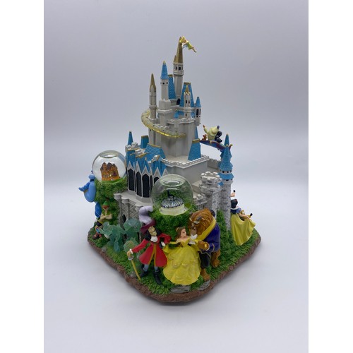 269 - DISNEY MAGIC KINGDOM MULTI GLOBE SNOW GLOBE