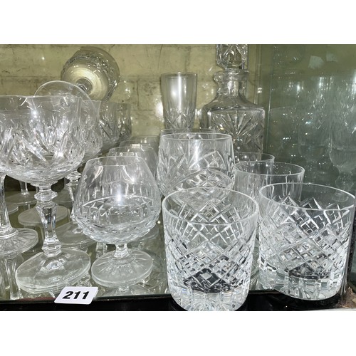 211 - SHELF OF CUT GLASS INCLUDING WATERFORD GOBLETS, ROYAL BRIERLEY WINE GLASSES, STUART TUMBLERS, AND GA... 