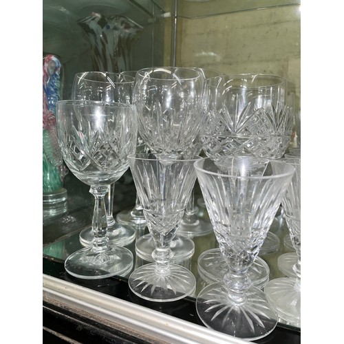 211 - SHELF OF CUT GLASS INCLUDING WATERFORD GOBLETS, ROYAL BRIERLEY WINE GLASSES, STUART TUMBLERS, AND GA... 