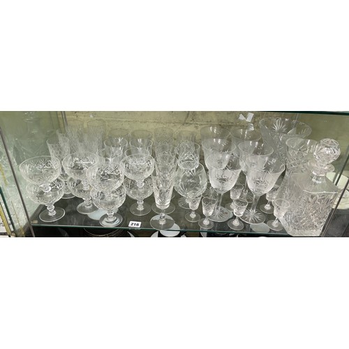 216 - SHELF OF CUT GLASSWARE INCLUDING ROYAL DOULTON SUNDAE DISHES, ROYAL BRIERLEY FLUTES, DECANTERS AND T... 