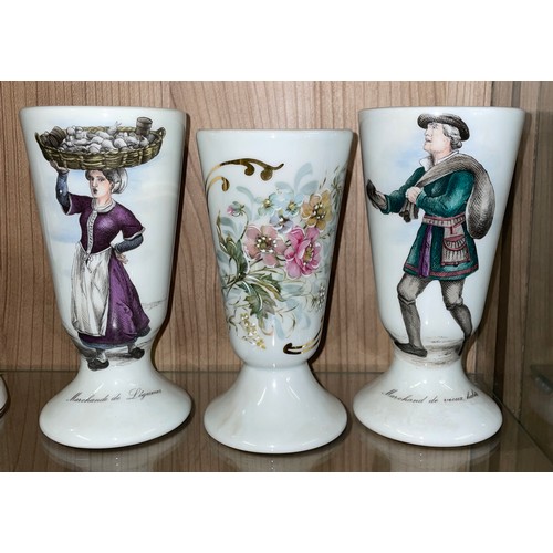 250 - THREE LIMOGE TRANSFER PRINTED PEDESTAL BEAKERS