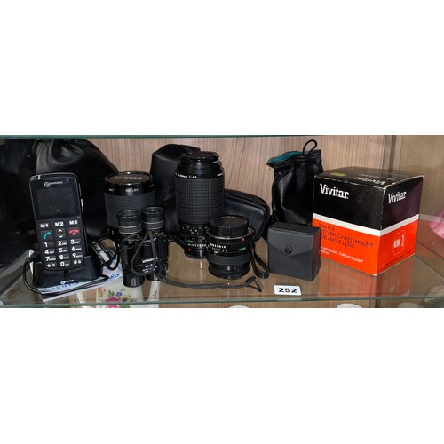 252 - CANON ZOOM LENS, SIRIUS REFLEX LENS, TASCO VOYAGER II 8X21 BINOCULARS, VIVITAR AUTOMATIC WIDE ANGLE ... 