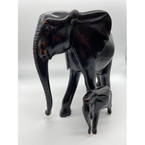 232 - POLISHED WOOD FIGURE OF ELEPHANT AND CALF