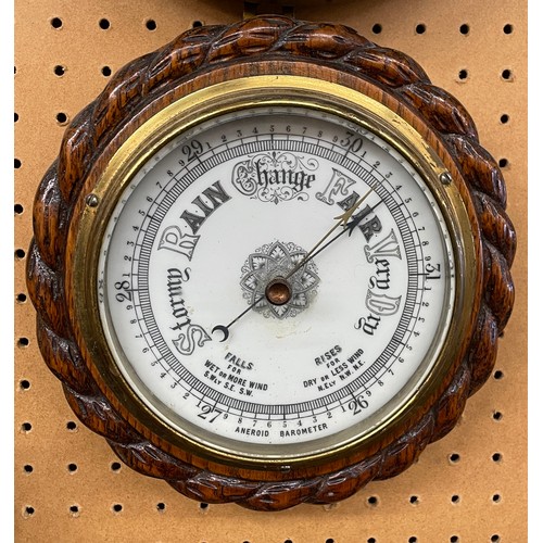 409 - CARVED OAK CASED ANEROID BAROMETER