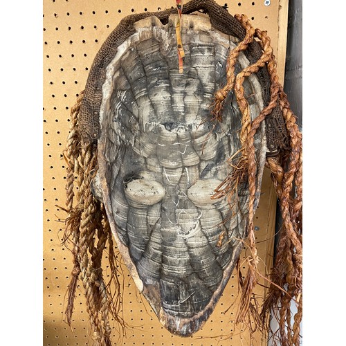 559 - CARVED AFRICAN TRIBAL WALL MASK WITH BRAIDED HAIR