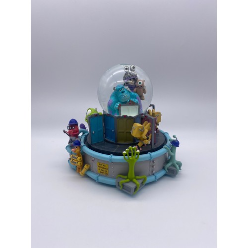 289 - DISNEY AND PIXAR MONSTERS INC. MONSTROPOLIS SNOW GLOBE