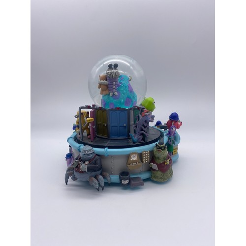 289 - DISNEY AND PIXAR MONSTERS INC. MONSTROPOLIS SNOW GLOBE