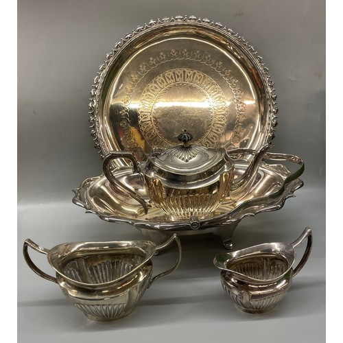 240 - EPNS EMPIRE STYLE RIBBED TEAPOT, SUGAR BOWL AND CREAMER ON AN ENGRAVED CIRCULAR TRAY