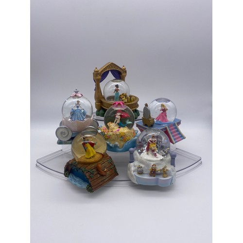 297 - SIX DISNEY PRINCESS MINI SNOW GLOBES INCLUDING CINDERELLA, SLEEPING BEAUTY, AND BELLE