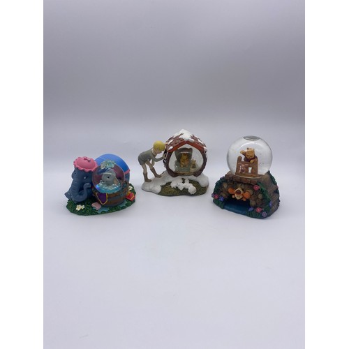 302 - DISNEY WINNIE THE POOH AND DUMBOS BUBBLE BATH SNOW GLOBES