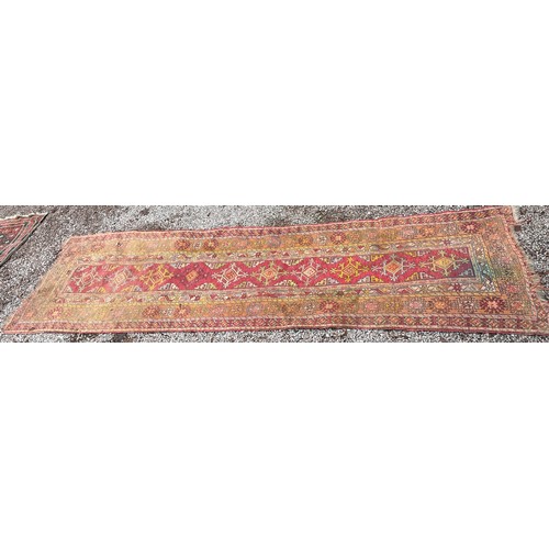 81 - LATE 19TH CENTURY CAUCASIAN CARPET RUNNER 316cm