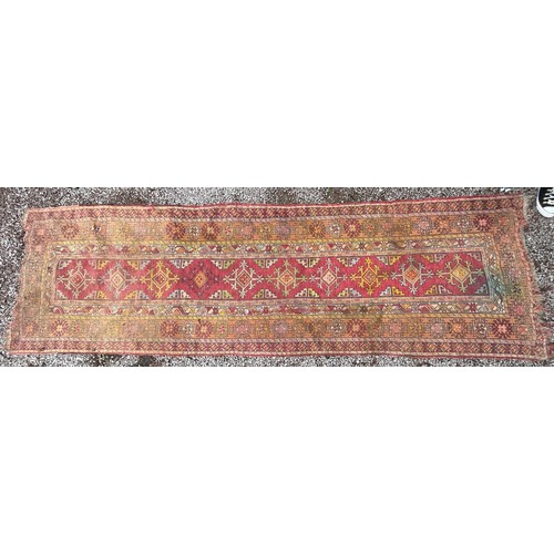 81 - LATE 19TH CENTURY CAUCASIAN CARPET RUNNER 316cm