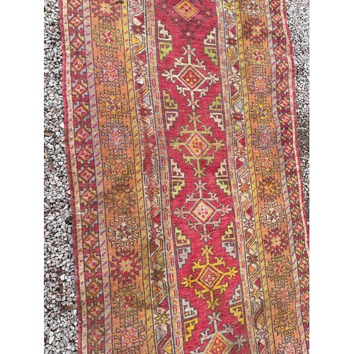 81 - LATE 19TH CENTURY CAUCASIAN CARPET RUNNER 316cm