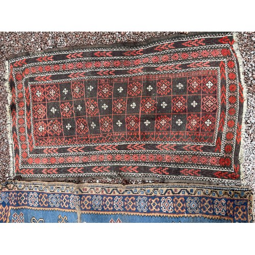 80 - THREE SMALL LATE 19TH CENTURY CAUCASIAN CARPETS/MATS