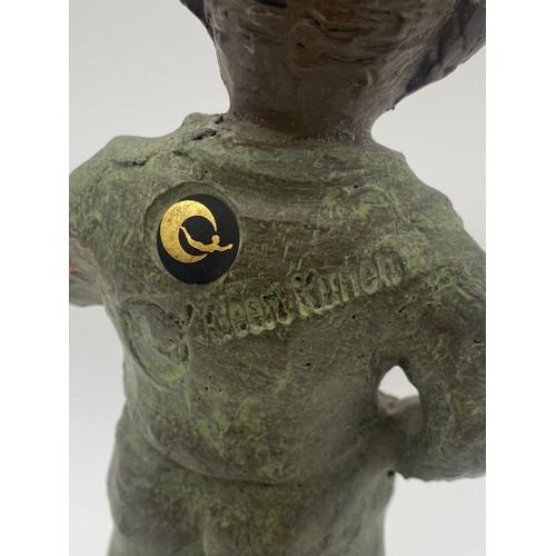 519 - GEERT KUNEN CERAMIC FIGURE OF CHILD WITH DOLL 16CM H