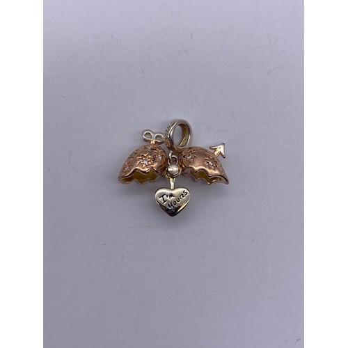 597 - THREE 925 GILT HEART CHAMELEON CHARMS