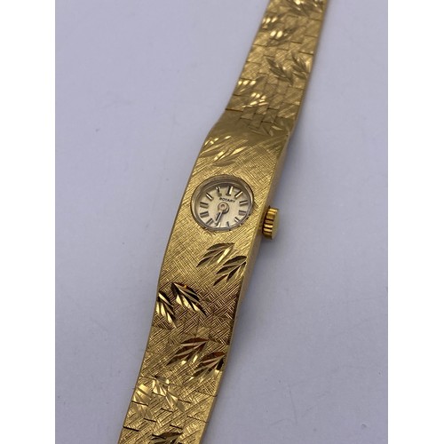 599 - LADIES ROTARY WRISTWATCH ON BARK EFFECT BRACELET STRAP AND ONE WITH LEAF DESIGN BRACELET STRAP