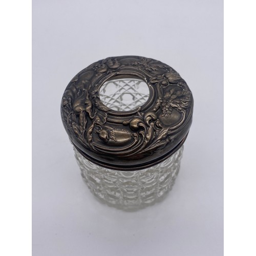 481 - BIRMINGHAM SILVER REPOUSSE AND CUT GLASS POWDER JAR