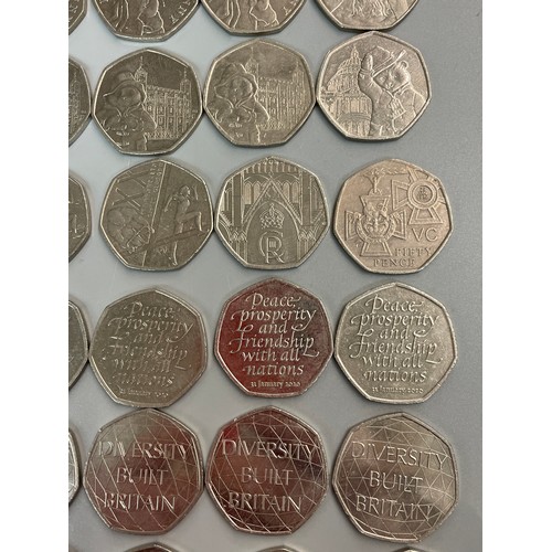 473 - BAG OF 50 PENCE PIECES INCLUDING PETER RABBIT, PADDINGTON, 2012 OLYMPIC GAMES, SHERLOCK HOLMES