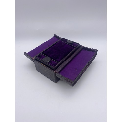 468 - SMALL MOROCCAN LEATHER JEWELLERY BOX WITH PURPLE LINING