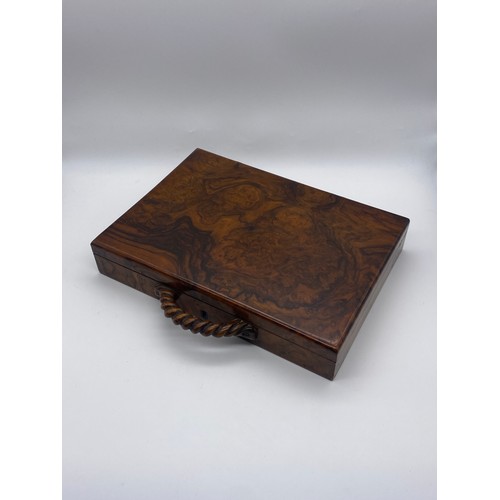 484 - BURR WALNUT AND ROPE TWIST HANDLED NOVELTY CASE WITH RED LINING