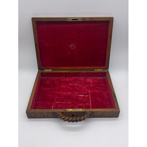 484 - BURR WALNUT AND ROPE TWIST HANDLED NOVELTY CASE WITH RED LINING