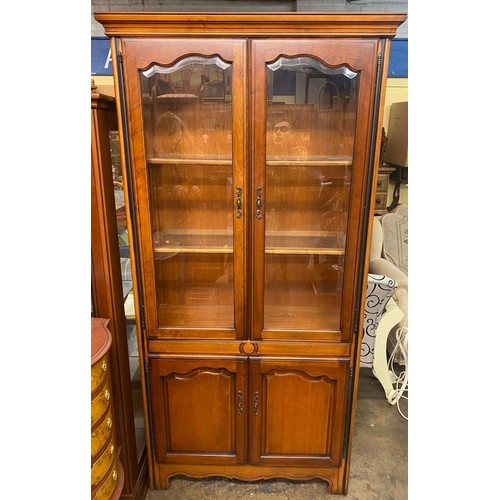 81 - CHERRY WOOD BEVEL GLAZED VITRINE CABINET