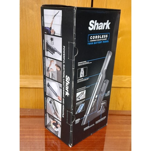 75 - SHARK CORDLESS HAND HELD VACUUM CLEANER