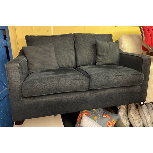 98 - BLACK FABRIC SPRING ACTION TWO SEATER SOFA BED AND MATCHING ARMCHAIR