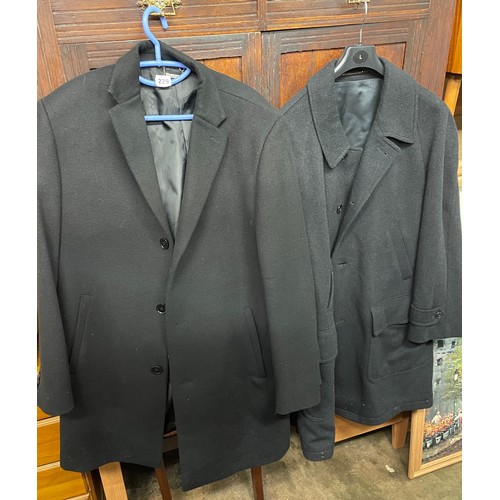 229 - TWO BLACK WOOLEN OVER COATS SIZE 44R