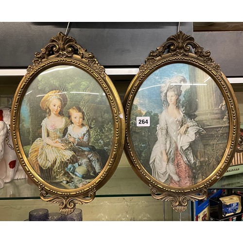 264 - PAIR OF ITALIAN OVAL METAL FRAMED PRINT PANELS