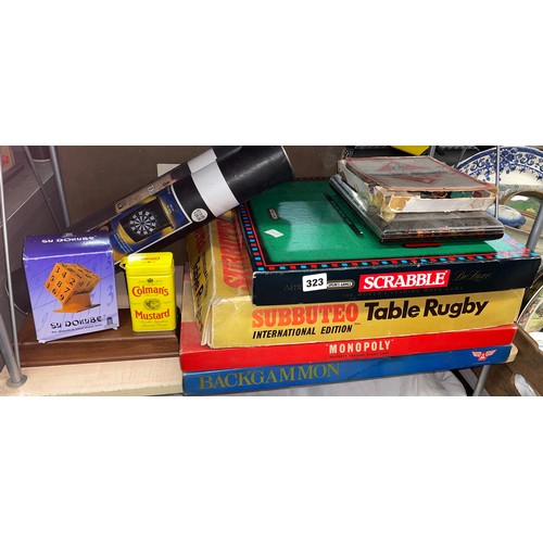 323 - SHELF OF BOARD GAMES AND SUBBUTEO TABLE RUGBY