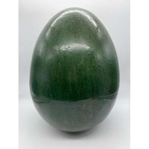 314 - BOTTLE GREEN GLAZED STUDIO POTTERY OVERSIZED EGG 42cm