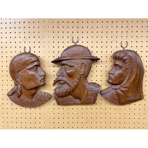 469 - THREE CHIP CARVED PORTRAIT PROFILES