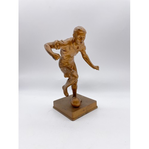 484 - GILDED SPELTER FIGURE OF A FOOTBALLER 21cm