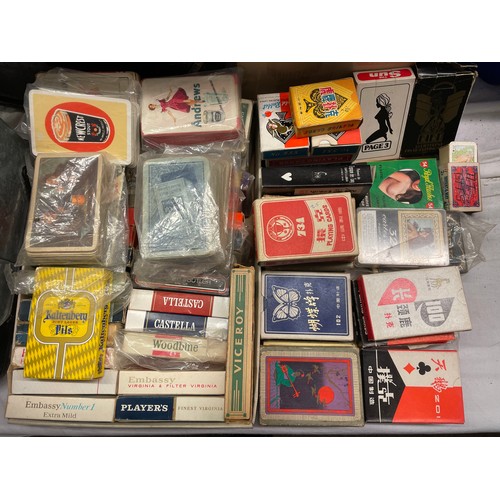 521 - CRATE OF DECKS OF PLAYING CARDS MAINLY CIGARETTE AND ALCOHOL ADVERTISING PLUS ASIAN AND ADULT PIN UP... 