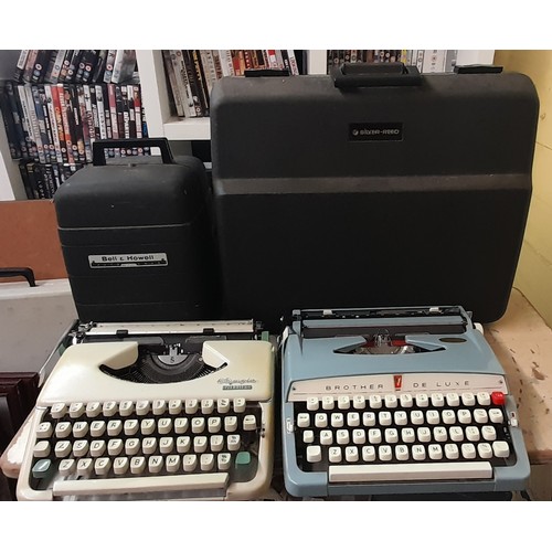 338 - TWO PORTABLE TYPEWRITERS, SILVER REED TYPE WRITER AND BELL AND HOWELL PROJECTOR