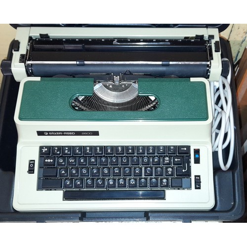 338 - TWO PORTABLE TYPEWRITERS, SILVER REED TYPE WRITER AND BELL AND HOWELL PROJECTOR