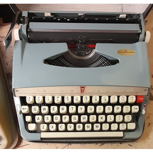 338 - TWO PORTABLE TYPEWRITERS, SILVER REED TYPE WRITER AND BELL AND HOWELL PROJECTOR