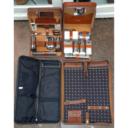 505 - TWO GENTS LEATHER CASED MID 20TH CENTURY TRAVELLING VANITY KITS AND TIE POUCHES