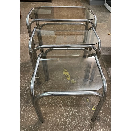 94 - TUBULAR FRAMED SMOKE GLASS NEST OF TABLES