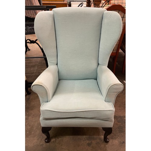 131 - POWDER BLUE FABRIC WING ARMCHAIR