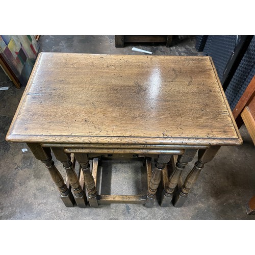 161 - NEST OF THREE OAK SLENDER TURNED LEG TABLES