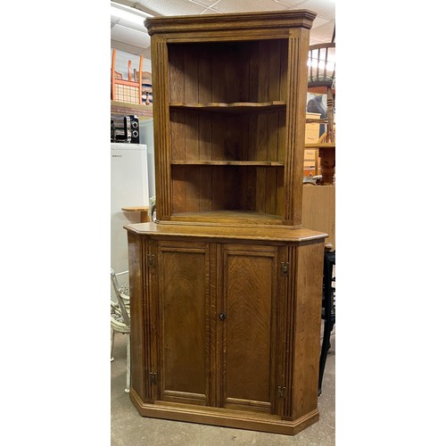 92 - GOOD QUALITY OAK TWO DOOR CORNER CABINET WITH OPEN SHELVING TOP