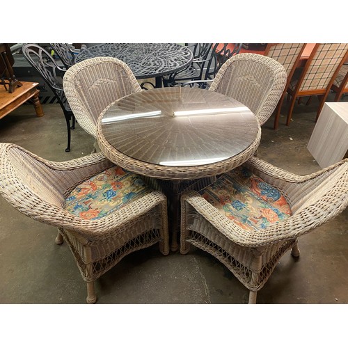 84 - BLEACHED RATTAN CIRCULAR/PATIO TABLE AND FOUR HIGH BACK CHAIRS